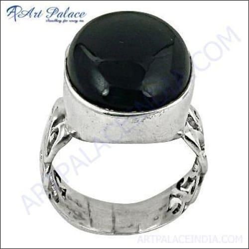 Elegant handmade silver ring featuring a stunning black onyx gemstone, showcasing intricate craftsmanship and design.