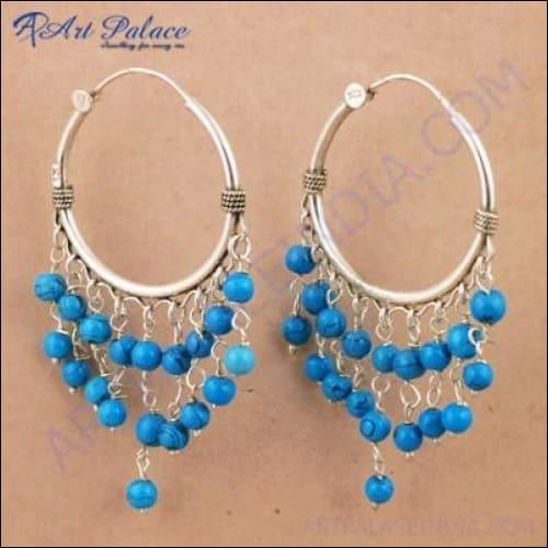 Elegant Indian Touch Synthetic Turquoise Gemstone Silver Earrings showcasing vibrant turquoise stones set in high-quality silver.
