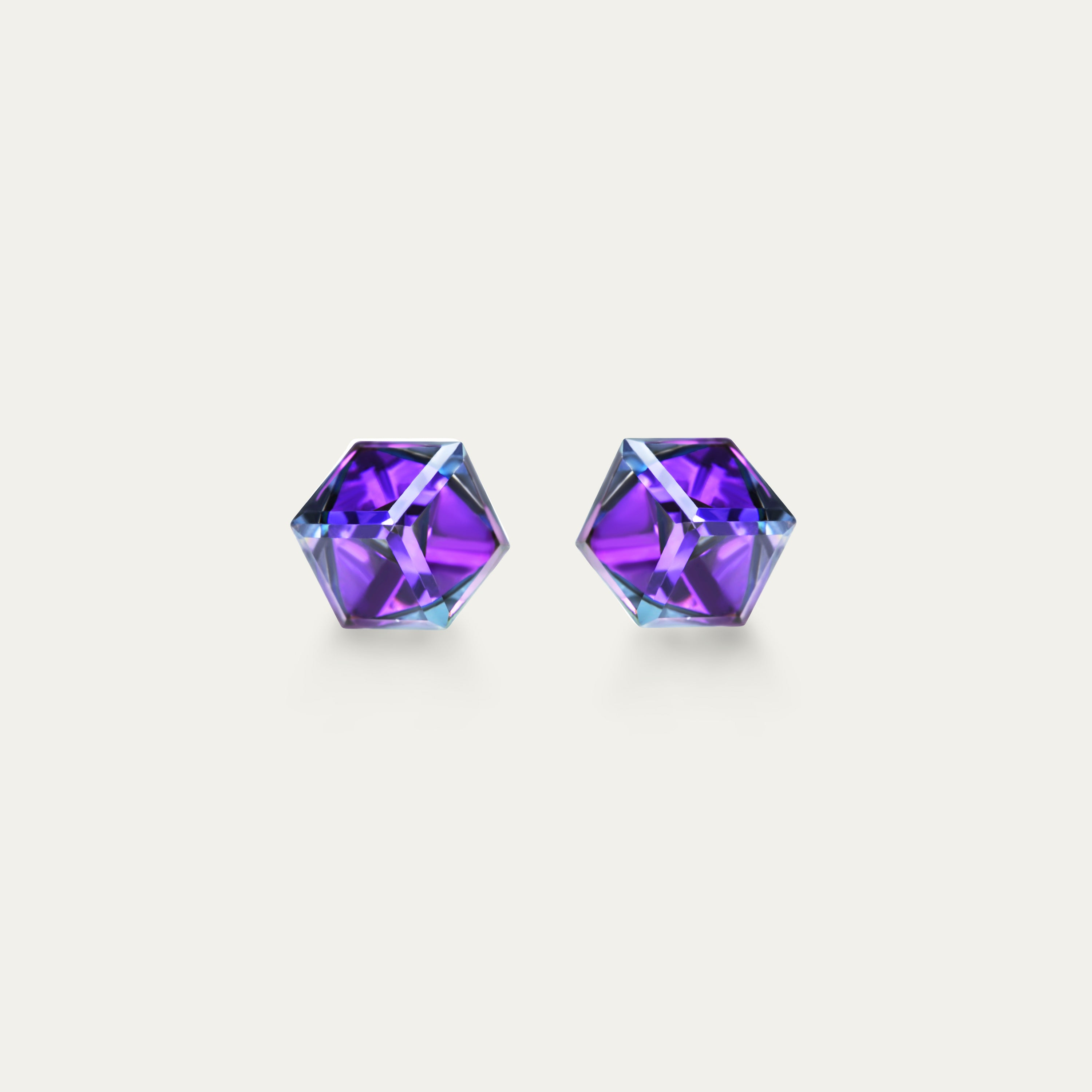 Irene - Heliotrope 4mm Iridescent & Purple Color Cubic Crystal earrings on a white background, showcasing their elegant design and shimmering crystals.