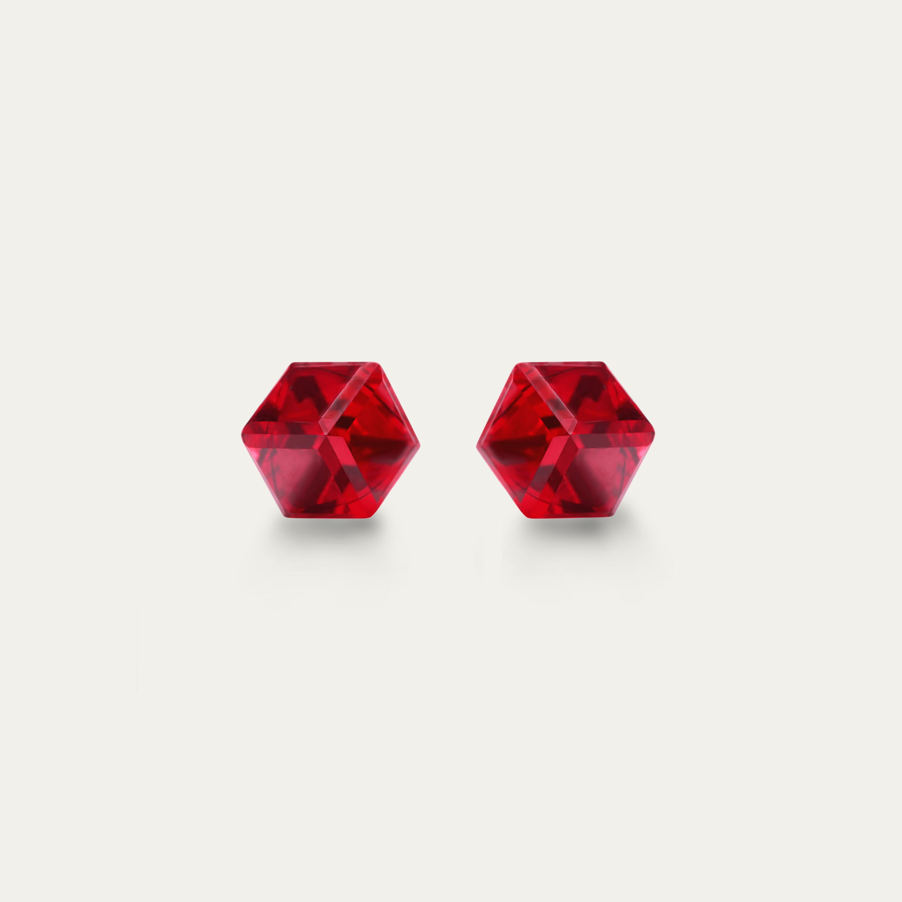 Irene - Light Siam - 4mm Red Color Cubic Crystal hypoallergenic stainless steel stud earrings, showcasing a vibrant red crystal in a sleek design.