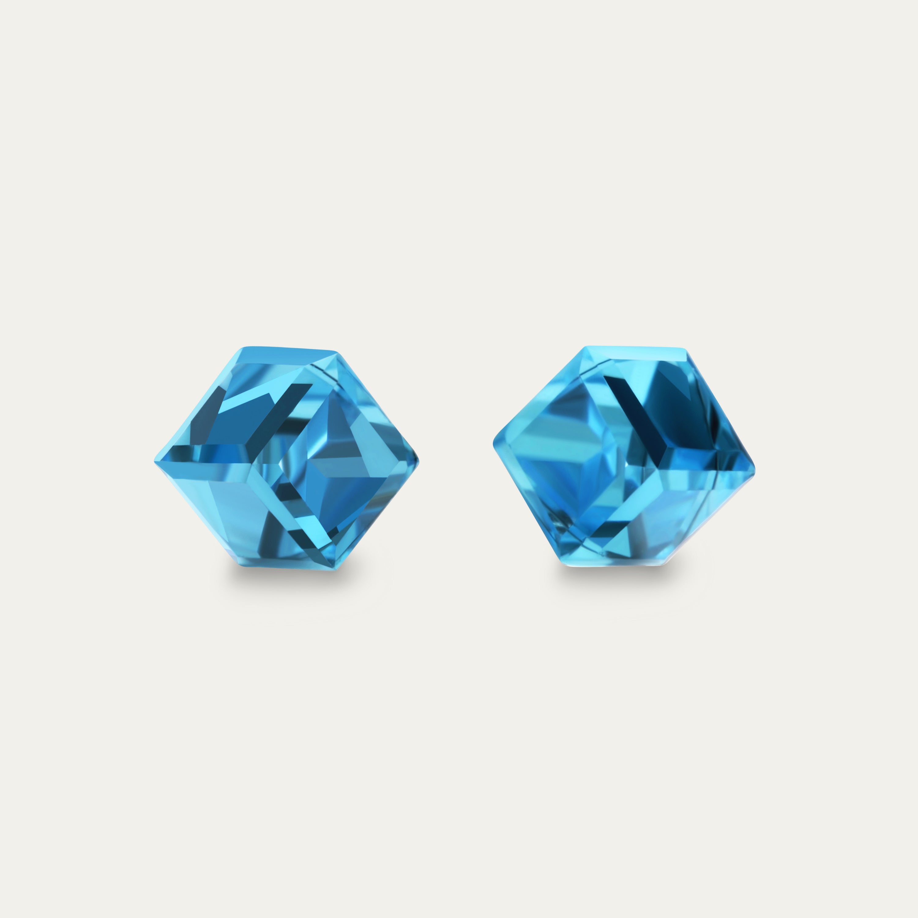 Iris Aquamarine 6mm Blue Color Cubic Crystal earrings on a white background, showcasing their elegant design and hypoallergenic stainless steel setting.