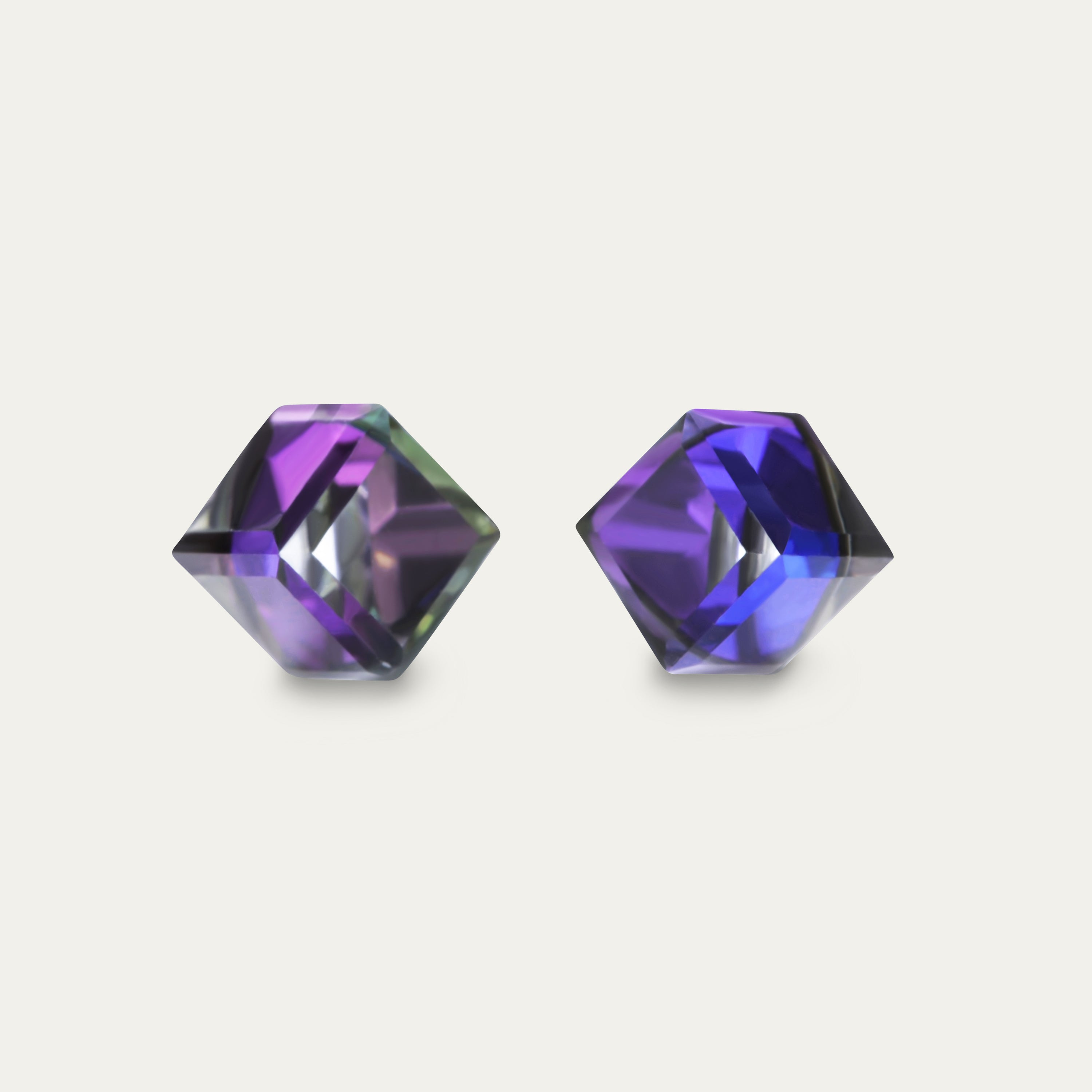 Iris - Heliotrope 6mm Iridescent & Purple Color Cubic Crystal earrings on a white background, showcasing their stunning design and shine.