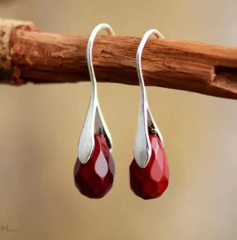 A pair of vibrant red Jasper Drop Earrings showcasing their elegant bohemian design and genuine Jasper stones.