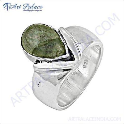 A stunning pear-shaped Labradorite gemstone ring set in 925 silver, showcasing its unique iridescent colors.