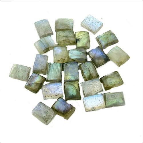 A stunning semi-precious Labradorite gemstone showcasing its unique iridescent colors, perfect for jewelry making.