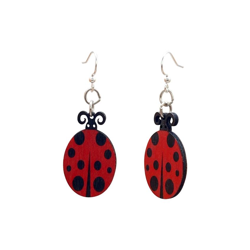 A pair of stylish lady bug earrings made from sustainably sourced wood, featuring a vibrant design and silver-finished hypoallergenic ear wires.