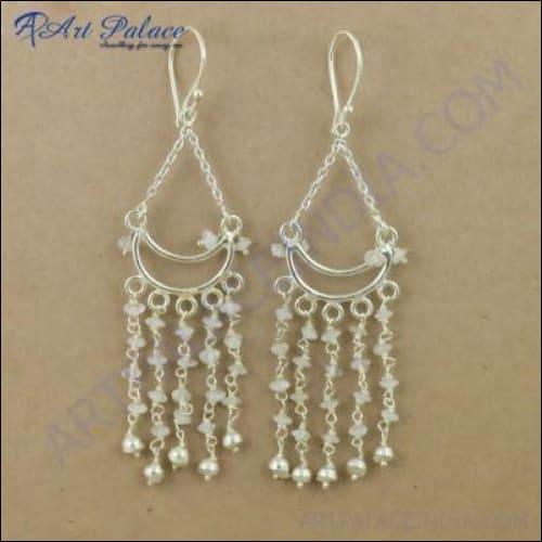 A pair of elegant silver earrings featuring beaded rainbow moonstone gemstones, showcasing their iridescent colors.