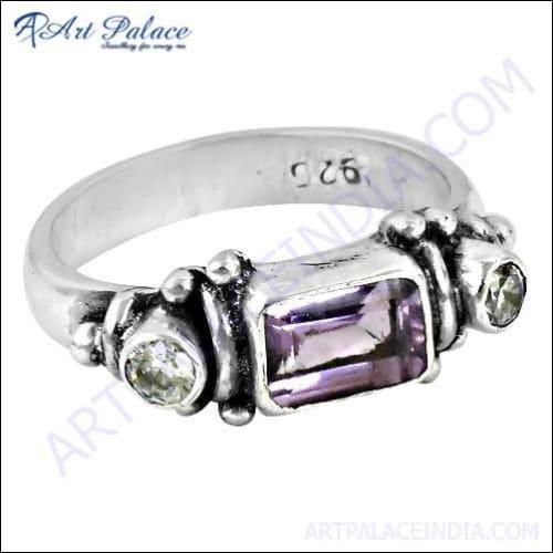 A luxurious silver ring featuring a stunning amethyst cubic zirconia gemstone, showcasing intricate design and craftsmanship.
