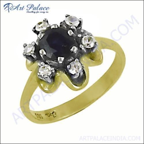 A luxurious silver ring featuring a cubic zirconia design and a genuine iolite gemstone, showcasing elegance and craftsmanship.