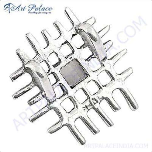 A luxurious silver fretwork pendant featuring a stunning rainbow moonstone, showcasing intricate design and vibrant colors.