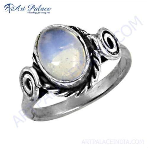 A luxurious designer ring featuring a synthetic opal gemstone set in 925 sterling silver, showcasing intricate craftsmanship and vibrant colors.