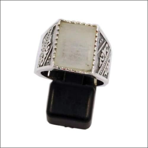 A beautifully crafted 925 silver ring featuring a faceted Libyan Tektite gemstone, showcasing its unique design and elegance.