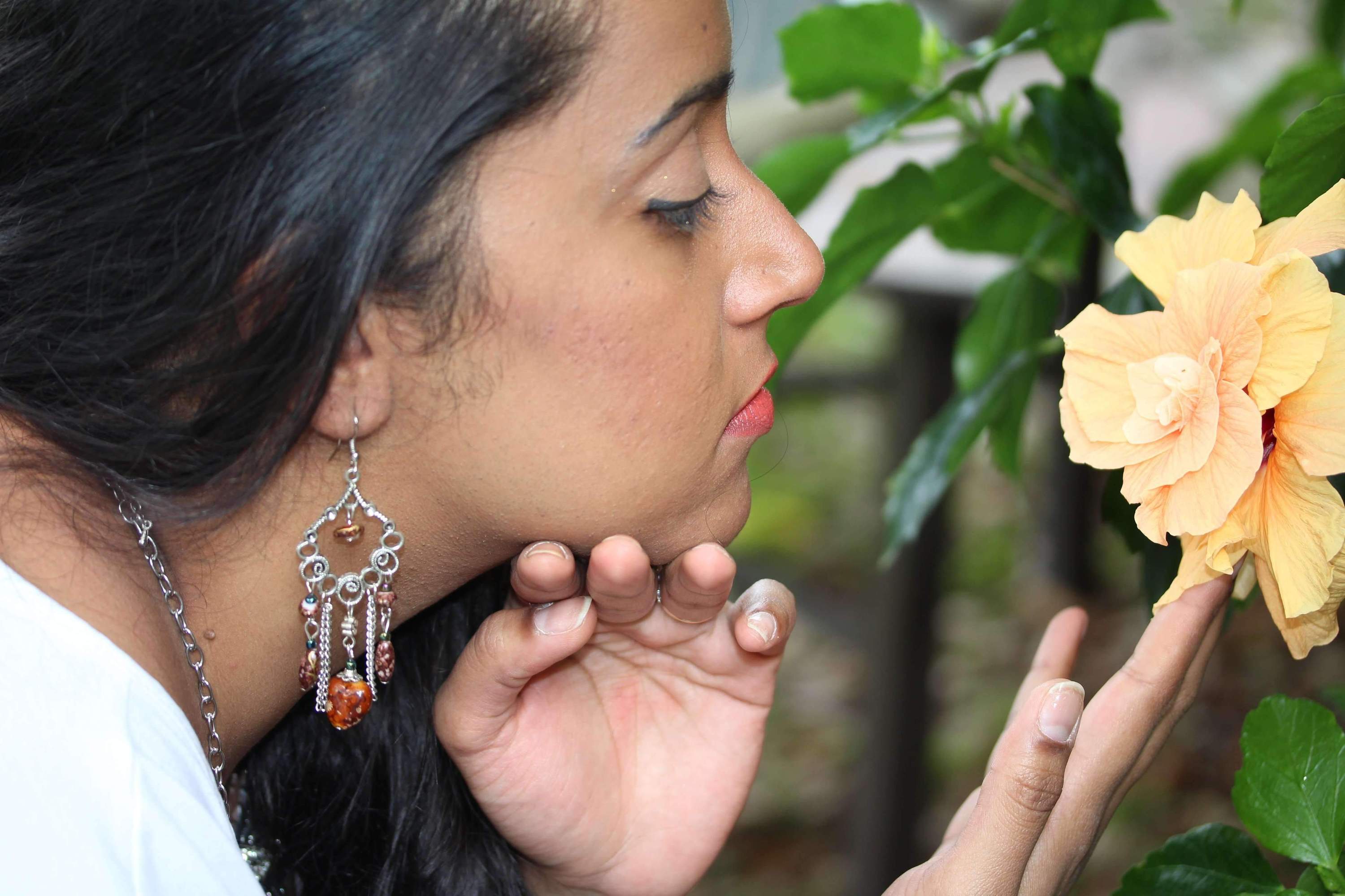Handmade marbled beads scroll work dangler earrings featuring flower charms, showcasing a unique chandelier design.