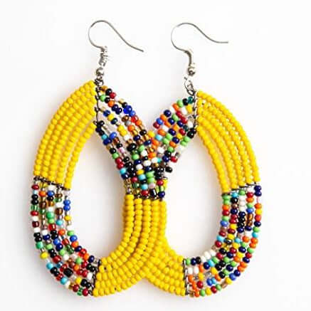 A pair of vibrant yellow Maasai handcrafted beaded earrings, featuring an oval shape and intricate beadwork, perfect for any occasion.