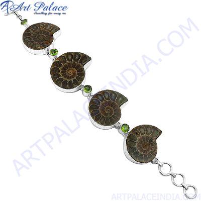 Natural Ammonite and Peridot Gemstone Bracelet in 925 Silver, showcasing unique ammonite patterns and vibrant green peridot accents.