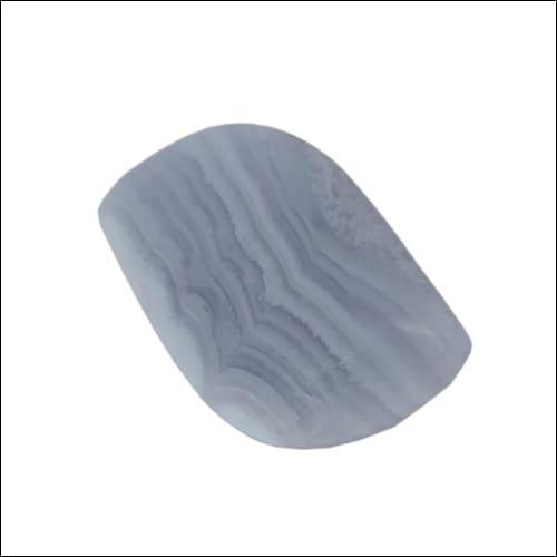 Natural Blue Lace Stone and colorless gemstones displayed elegantly, showcasing their captivating beauty and transparency.