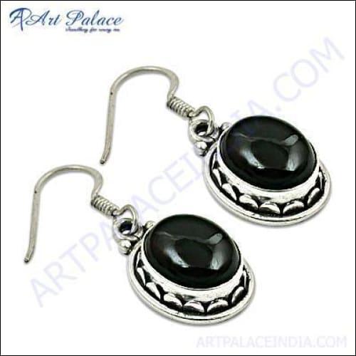 Elegant New Stylist Silver Garnet Gemstone Earrings showcasing intricate design and vibrant garnet stones.