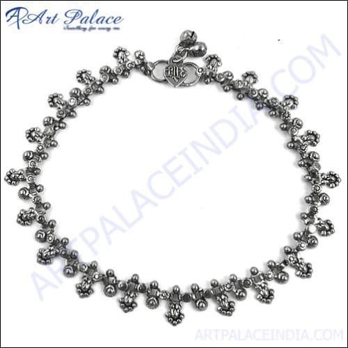 Elegant German Silver Anklets featuring intricate designs, perfect for enhancing any outfit.