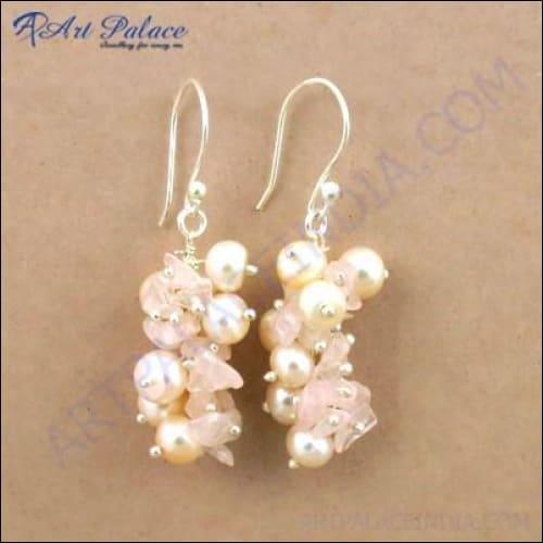 Elegant silver beaded earrings featuring pearl and rose quartz gemstones, showcasing a stylish design perfect for any occasion.