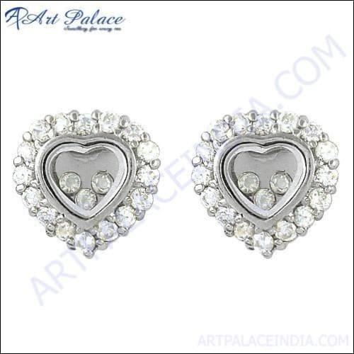 Trendy heart style silver earrings featuring sparkling cubic zirconia gemstones, perfect for any occasion.
