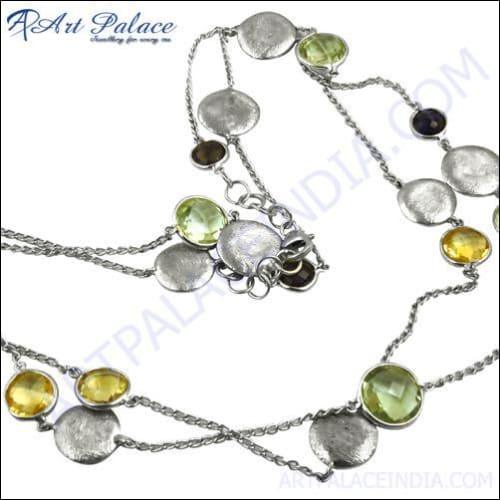 Elegant silver necklace featuring citrine, green amethyst, and smokey quartz gemstones, showcasing intricate design and craftsmanship.