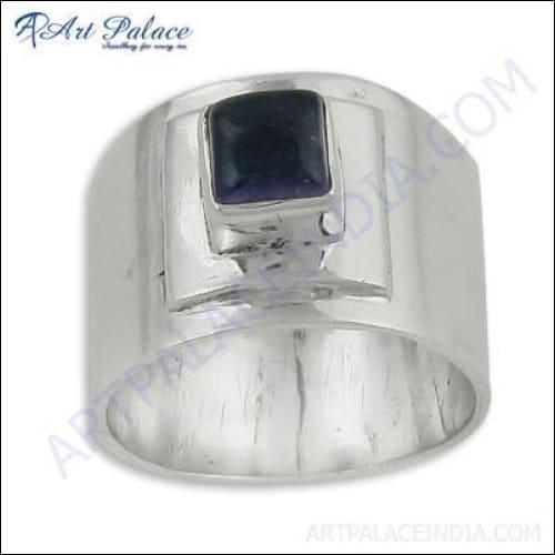 Trendy amethyst gemstone sterling silver ring showcasing a vibrant purple stone set in a sleek silver band.