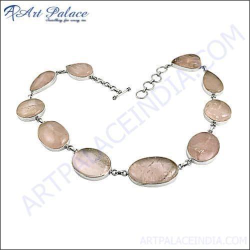Elegant rose quartz sterling silver necklace featuring a soft pink pendant on a stylish chain, perfect for any occasion.