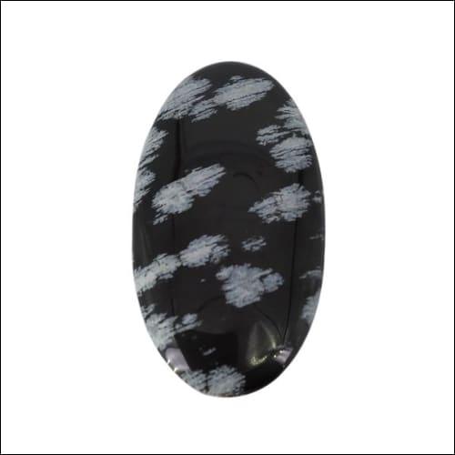 A beautifully crafted Snowflake Stone showcasing intricate snowflake-like patterns and round shape, perfect for jewelry.