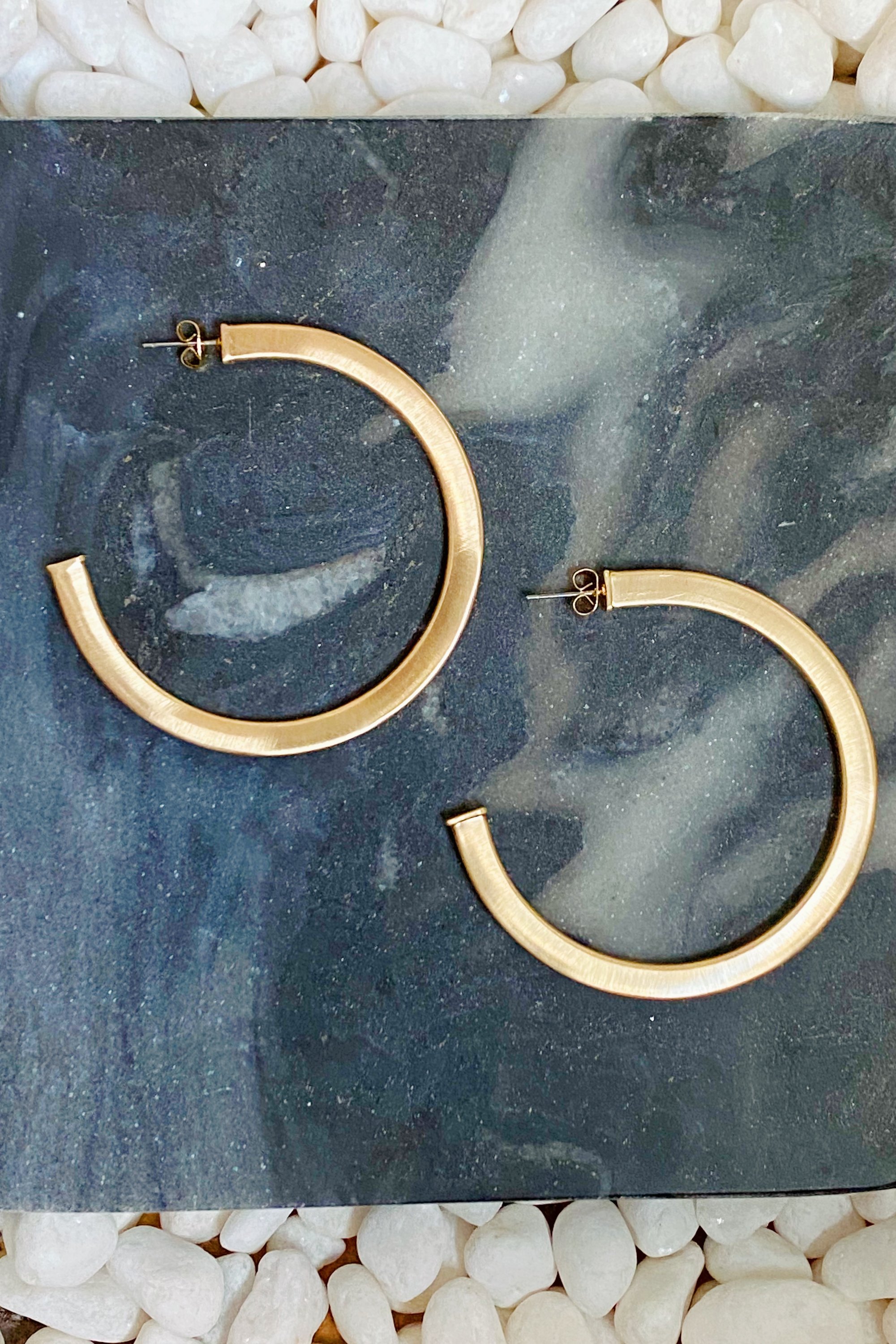 Overall Luxe Round Hoop Earrings with satin finish and open square shape, gold plated and lightweight design.