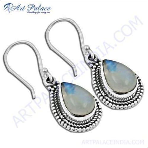 Elegant pear-shaped earrings featuring rainbow moonstone, showcasing unique colors and craftsmanship.