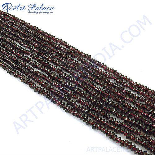 A strand of vibrant Red Garnet gemstone beads, showcasing their rich color and natural beauty, perfect for jewelry making and healing.