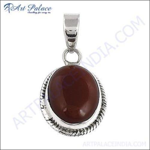 A stunning Red Onyx Pendant set in 925 sterling silver, featuring intricate ethnic designs that highlight its cultural significance and elegance.
