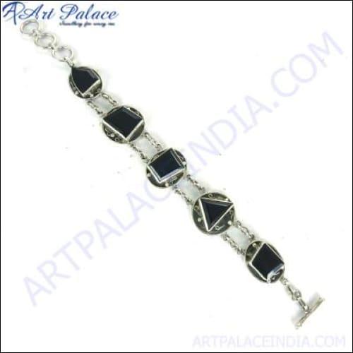 Royal 925 Sterling Silver Gemstone Bracelet showcasing a stunning gemstone centerpiece and intricate silver craftsmanship.