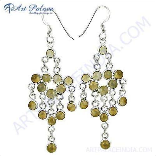 A pair of elegant 925 silver earrings featuring vibrant citrine gemstones, showcasing intricate craftsmanship and a stylish design.