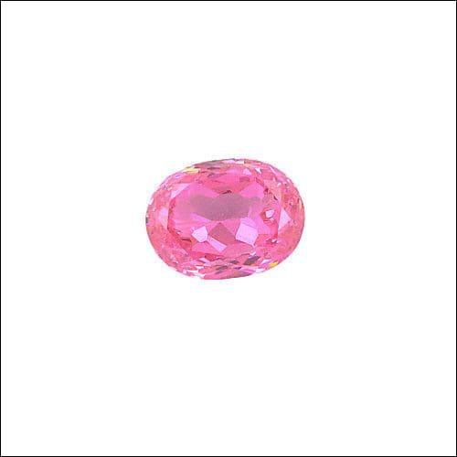 A collection of shining pink cubic zirconia stones, showcasing their brilliant cut and vibrant color, perfect for handmade jewelry.