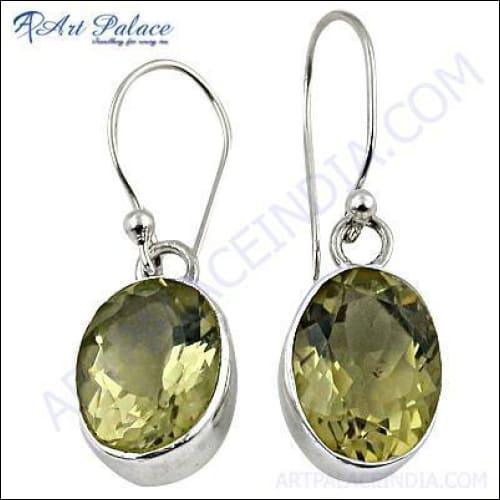 Elegant shiny citrine gemstone silver earrings, showcasing a vibrant yellow hue set in high-quality silver, perfect for any occasion.
