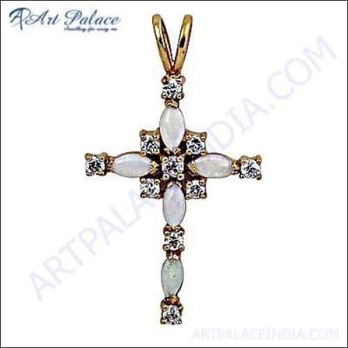 A stunning silver and gold plated cross style pendant featuring a rainbow moonstone centerpiece and sparkling cubic zirconia accents.