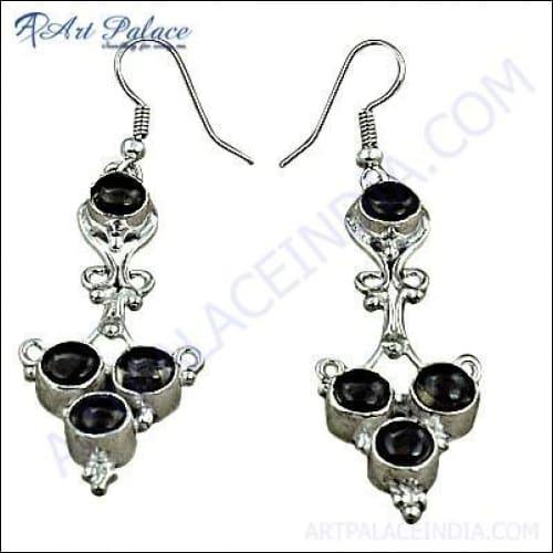 A pair of elegant smokey quartz silver earrings showcasing unique designs and craftsmanship.