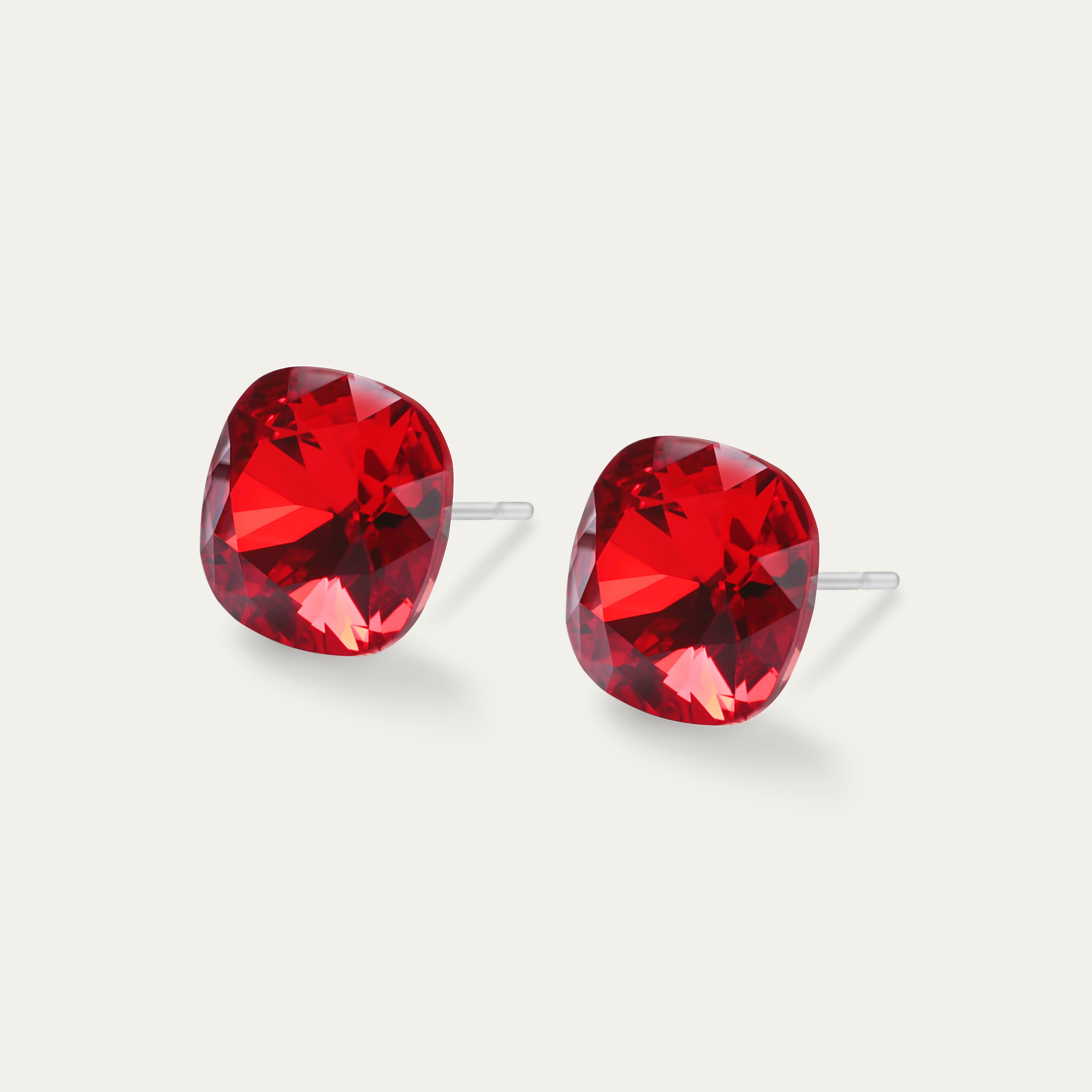 Sophia Light Siam 10mm Red Crystal Cushion Earrings on a white background, showcasing their elegant design and sparkling red crystals.