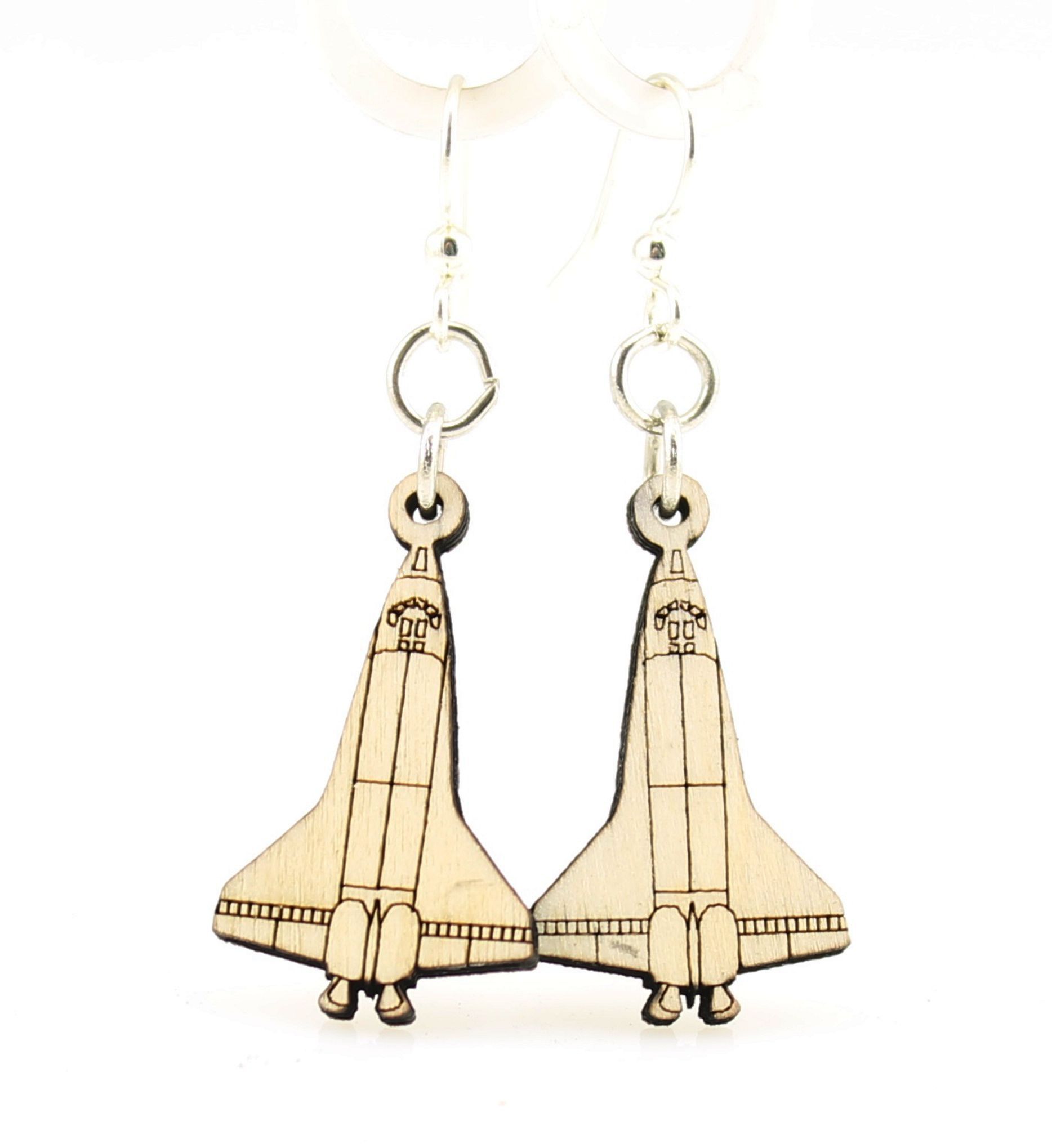 A pair of Space Shuttle Earrings made from sustainably sourced wood, featuring intricate laser-cut designs and hypoallergenic stainless steel ear wires.