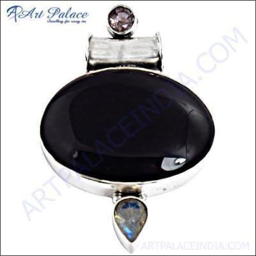 Sterling Silver Pendant featuring Black Onyx and Rainbow Moonstone, showcasing elegant design and craftsmanship.