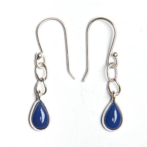 A pair of stunning 925 sterling silver earrings featuring blue chalcedony in a pear cabochon design, elegantly displayed.