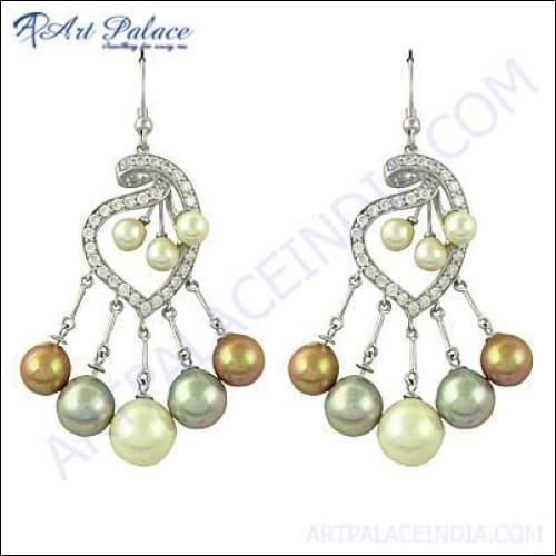 Stunning 925 sterling silver earrings featuring cubic zirconia and pearl accents, showcasing elegant design and craftsmanship.