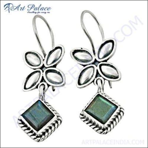 A pair of stunning 925 sterling silver earrings featuring a flower design with labradorite stones, showcasing intricate craftsmanship.