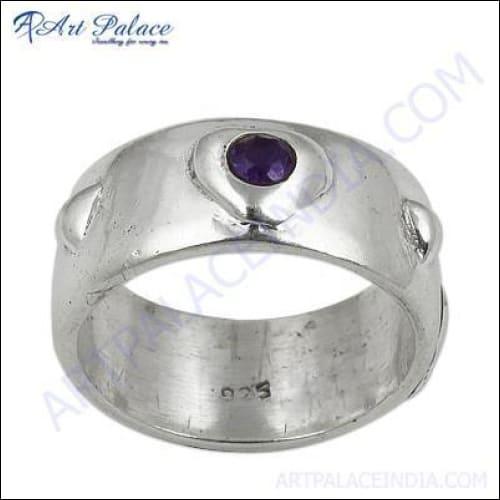 A stunning silver ring featuring a vibrant amethyst cubic zirconia gemstone, showcasing intricate craftsmanship and elegant design.