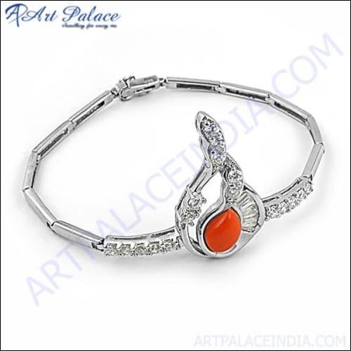 Stunning antique-style silver bracelet featuring cubic zirconia and synthetic coral, showcasing intricate craftsmanship and vibrant colors.