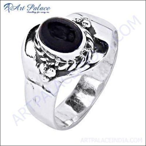 A stunning black onyx gemstone set in a 925 sterling silver designer ring, showcasing intricate craftsmanship and elegant design.