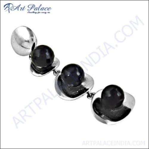 A stunning black spinel gemstone pendant set in 925 sterling silver, showcasing intricate craftsmanship and elegant design.
