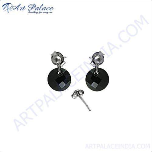 Stunning black spinel stud earrings set in sterling silver, showcasing their elegant design and sparkling stones.