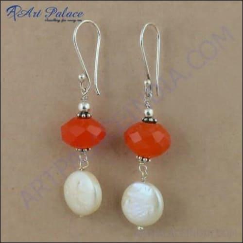 Stunning silver earrings featuring vibrant carnelian stones and lustrous pearls, elegantly designed for costume wear.